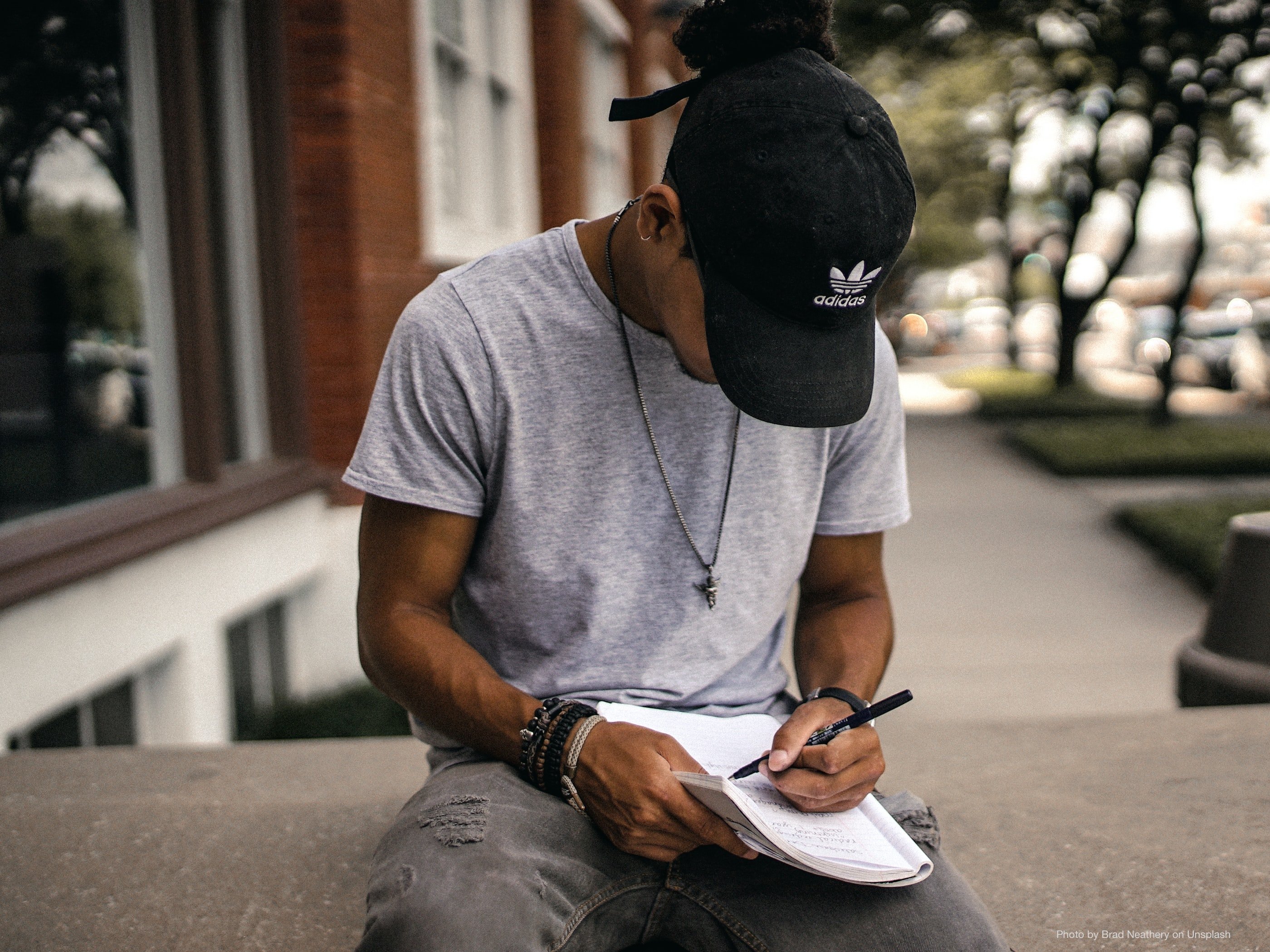 Young man writing